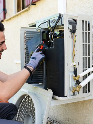 HVAC Engineer working on Heat Pump